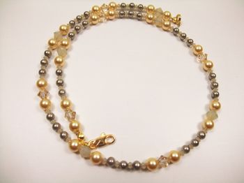 hk165-edle-goldfarbene-perlenkette-mit-kristallen.jpg